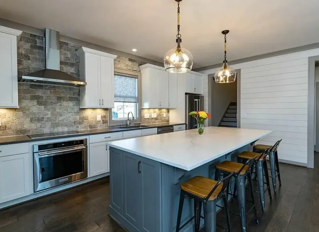 Modern Kitchen Remodel with White Kitchen Island Counter and blue cabinets | Mr. Countertops