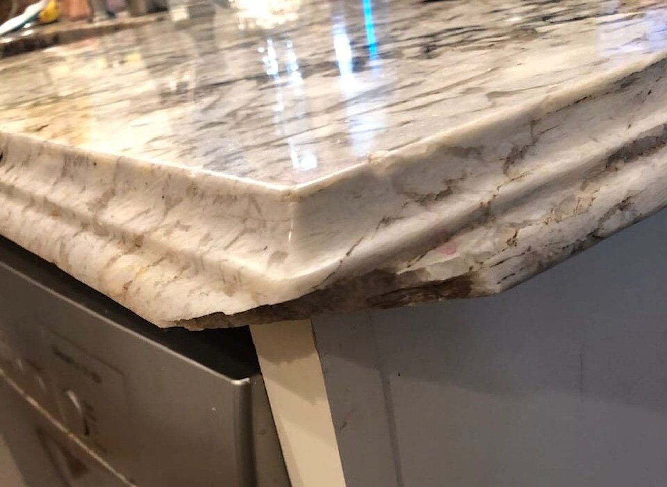 Broken Granite before expert repair by Mr.Countertops in Cleveland, OH