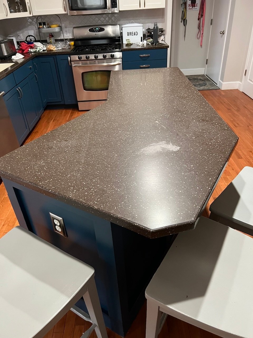 Avonite Solid Surface with Chemical Stain prior to repair and resurfacing.