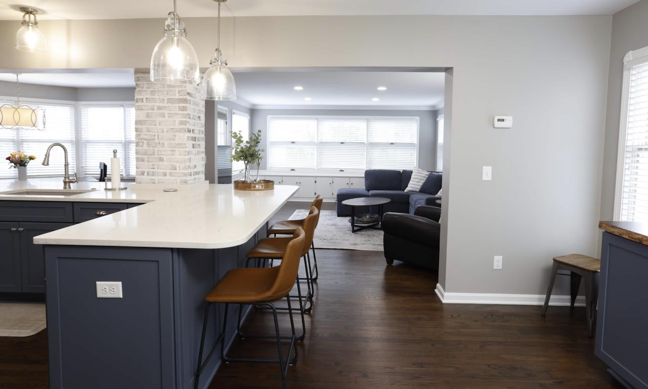 White Corian Countertops and island in modern Northeast Ohio Kitchen remodel
